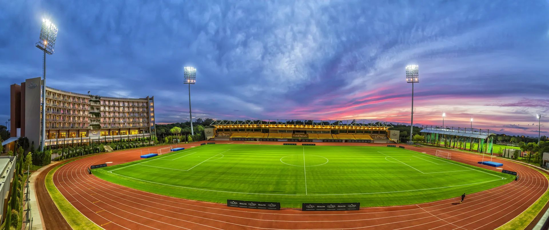 Gloria Sports Arena stadium illuminated at night
